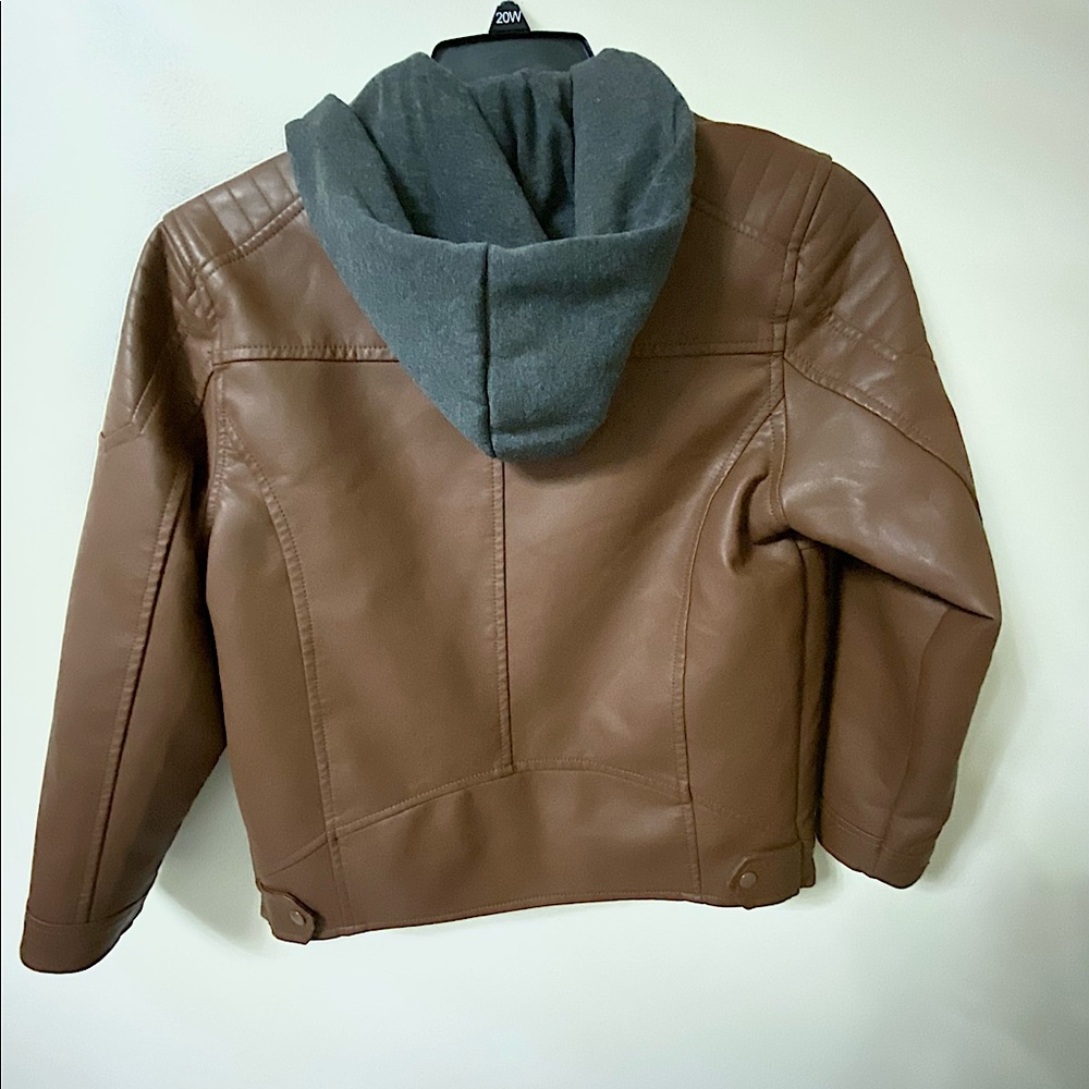 Brown leather coat, fur interior. Worn only a few times , in perfect condition.